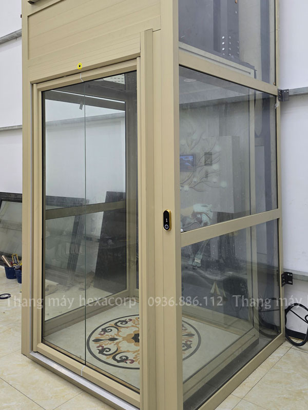 Thang Máy Gia Đình Thủy Lực Khung Vách Kính